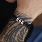 Engraved beads on black leather bracelet for men