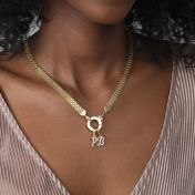 エマイニシャルクリスタル入れチャーム［ゴールドメッキ］