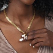 エマイニシャルクリスタル入れチャーム［ゴールドメッキ］