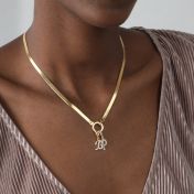 エマイニシャルクリスタル入れチャーム［ゴールドメッキ］